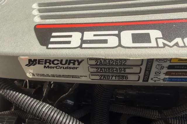 Slide: The Image of Engine compartment of a 2013 Regal 2500 Bowrider with Mercury MerCruiser 350 MPI. - 31