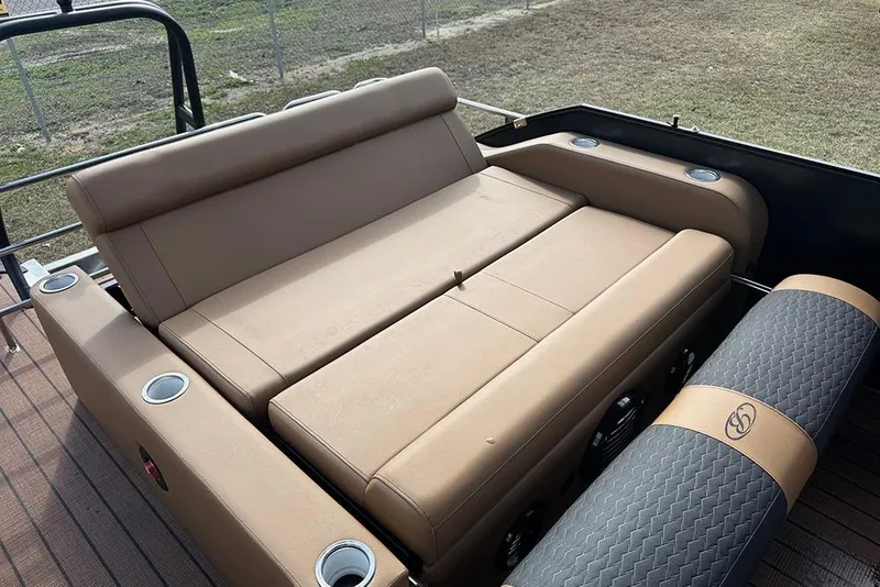 Slide: The Image of 2026 Bentley Pontoons Elite 253 Swingback Dual Captain Full Tritoon, luxurious seating area. - 30