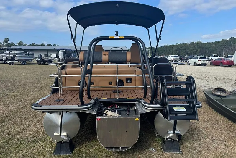 Slide: The Image of 2026 Bentley Pontoons Elite 253 Swingback Dual Captain Full Tritoon, rear view, outdoor display. - 4