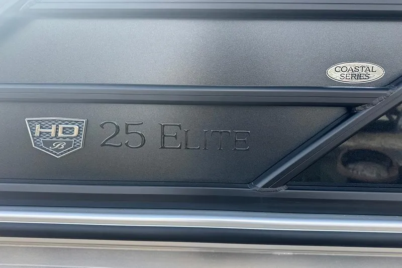 Slide: The Image of 2026 Bentley Pontoons Elite 253 Swingback Dual Captain Full Tritoon, Coastal Series emblem. - 9