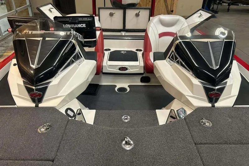 Slide: The Image of 2021 Ranger Z521L boat interior with dual seats and advanced navigation systems. - 11