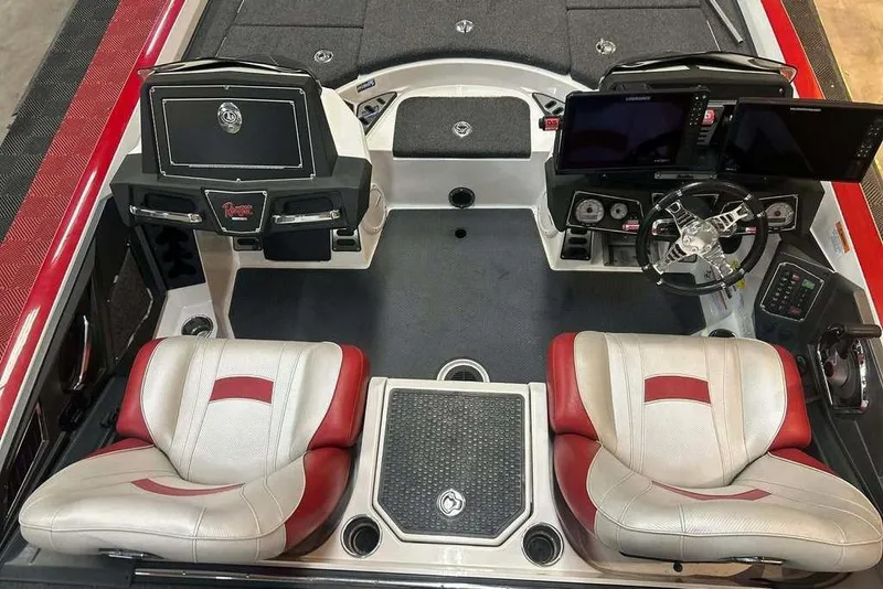 Slide: The Image of 2021 Ranger Z521L boat interior with dual seats, steering wheel, and control panels. - 3