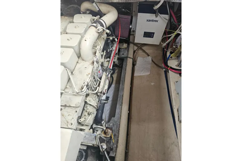 Slide: The Image of Engine compartment of a 1998 Nordic Tug 32 with Xantrex inverter. - 48