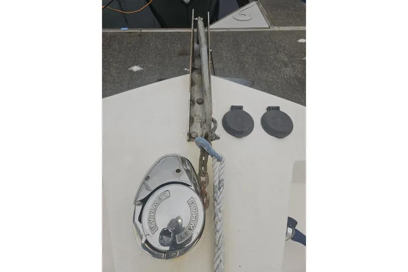 Slide: The Image of Bow of 1998 Nordic Tug 32 with anchor chain and winch. - 8