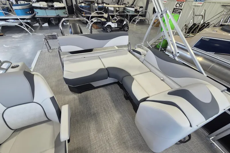 Slide: The Image of 2026 Avalon LSZ 2185 Cruise Rear Bench with modern seating in showroom. - 9