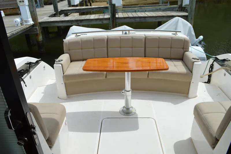 Slide: The Image of Interior of 2017 Tiara Yachts C44 Coupe with seating and table. - 20
