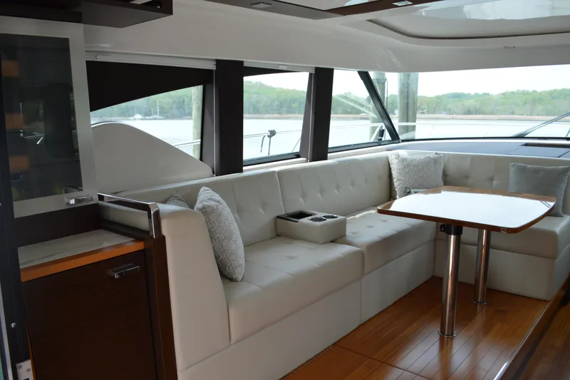 Slide: The Image of Interior of 2017 Tiara Yachts C44 Coupe with elegant seating area. - 22