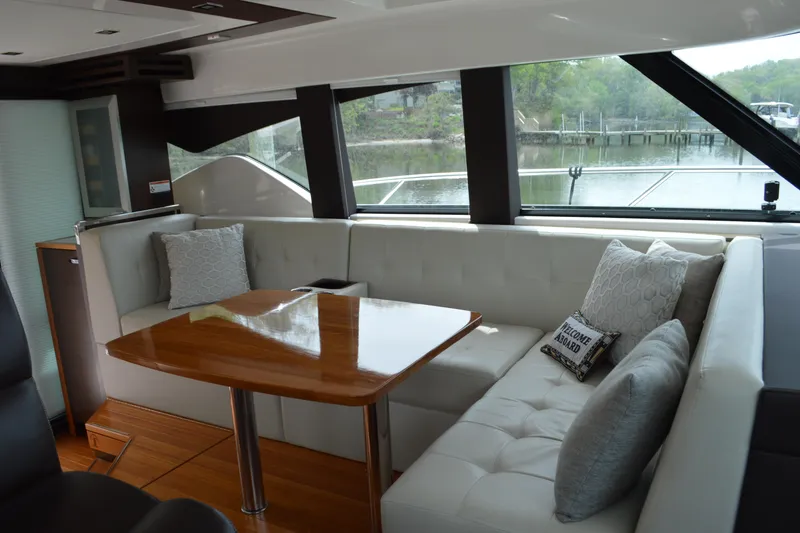 Slide: The Image of Interior of 2017 Tiara Yachts C44 Coupe with elegant seating area. - 23