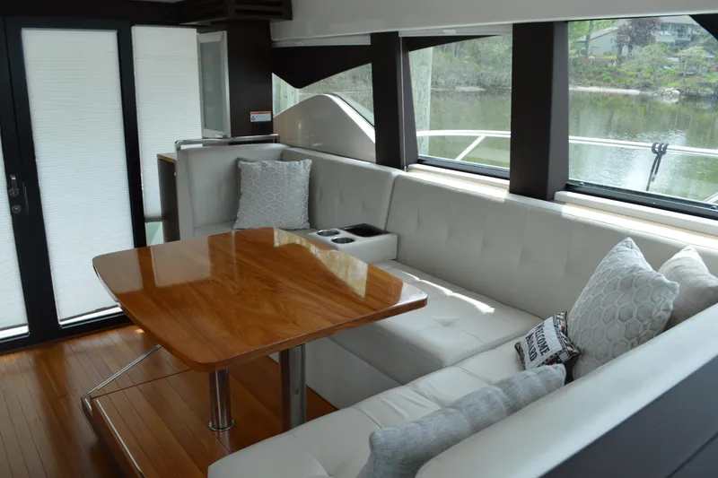 Slide: The Image of Interior of 2017 Tiara Yachts C44 Coupe with elegant seating area. - 24