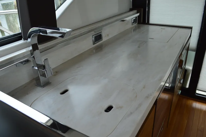 Slide: The Image of Modern kitchenette on a 2017 Tiara Yachts C44 Coupe. - 28