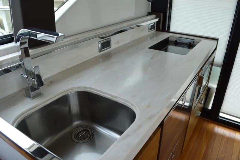 Slide: The Image of Modern kitchen on a 2017 Tiara Yachts C44 Coupe. - 29