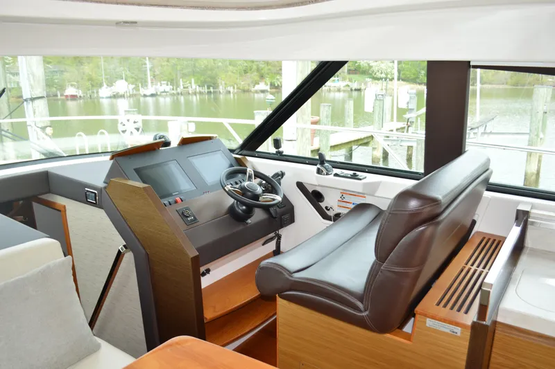 Slide: The Image of Interior of 2017 Tiara Yachts C44 Coupe helm station. - 32