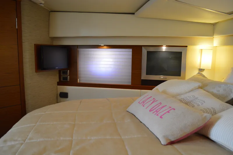 Slide: The Image of Luxurious bedroom interior of 2017 Tiara Yachts C44 Coupe with cozy bedding and modern amenities. - 41