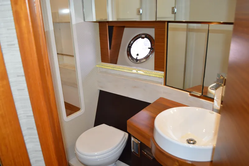 Slide: The Image of Luxurious bathroom interior of 2017 Tiara Yachts C44 Coupe with modern fixtures. - 45