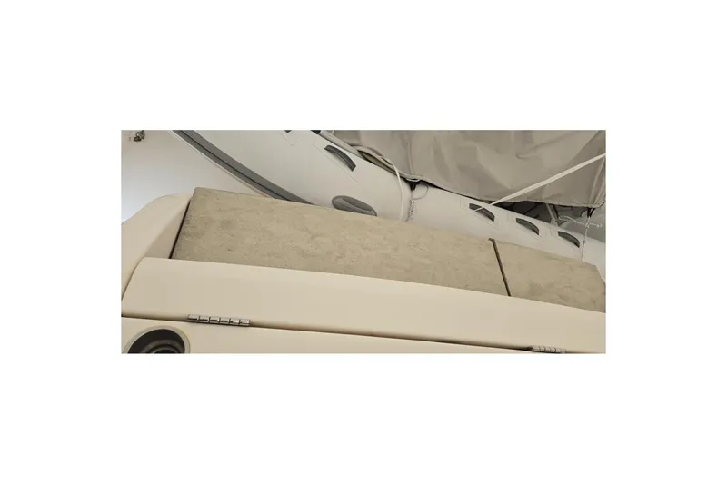 Slide: The Image of 2017 Tiara Yachts C44 Coupe interior detail with beige upholstery and sleek design elements. - 54