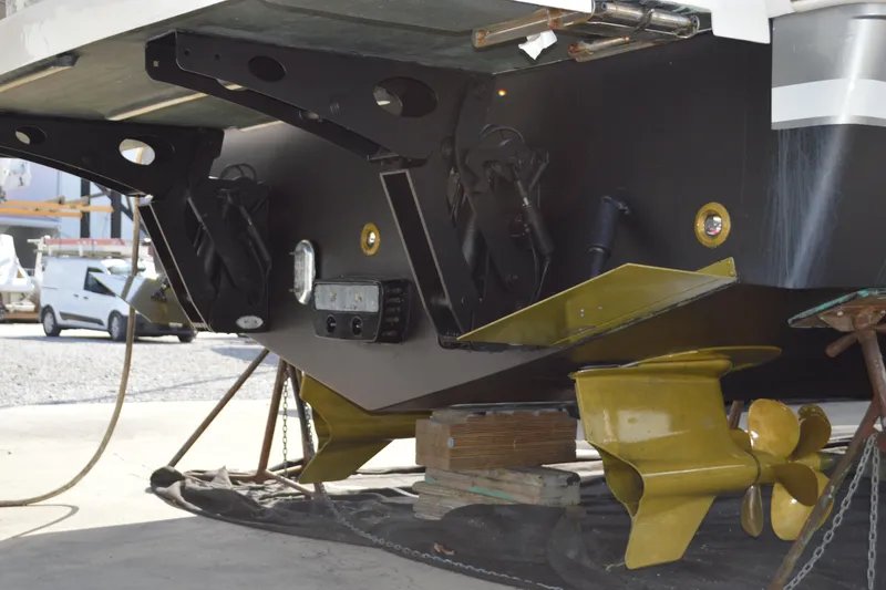 Slide: The Image of 2017 Tiara Yachts C44 Coupe underbody with propellers and rudder detail. - 8