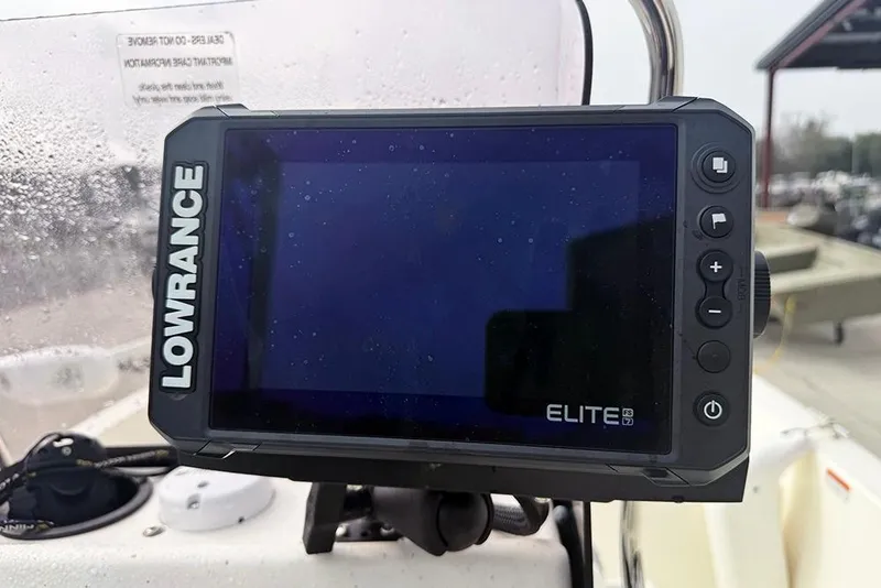 Slide: The Image of Lowrance Elite fishfinder on 2020 Mako Pro Skiff 15 CC boat dashboard. - 16