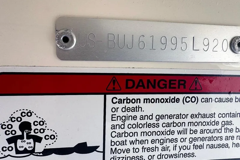 Slide: The Image of 2020 Mako Pro Skiff 15 CC warning label on carbon monoxide dangers. - 21