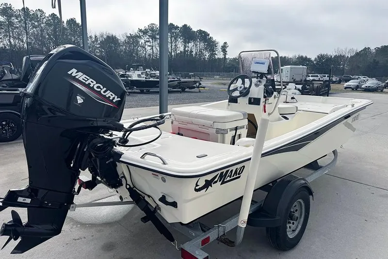 Slide: The Image of 2020 Mako Pro Skiff 15 CC boat with Mercury engine on trailer. - 5