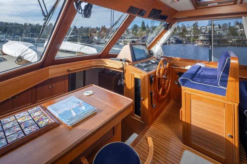 Slide: The Image of Interior of a 2003 Grand Banks 54 Eastbay SX yacht with wooden finish. - 22