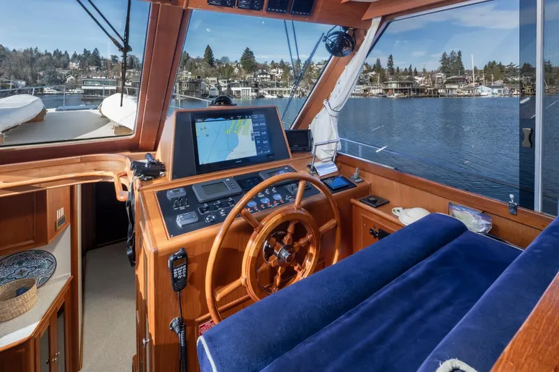 Slide: The Image of Helm of the 2003 Grand Banks 54 Eastbay SX yacht. - 23