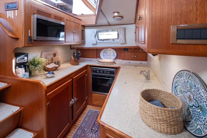 Slide: The Image of Kitchen of the 2003 Grand Banks 54 Eastbay SX yacht. - 27