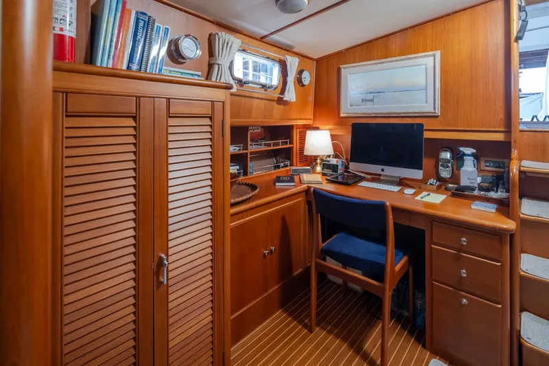 Slide: The Image of Interior of 2003 Grand Banks 54 Eastbay SX with desk and computer. - 29