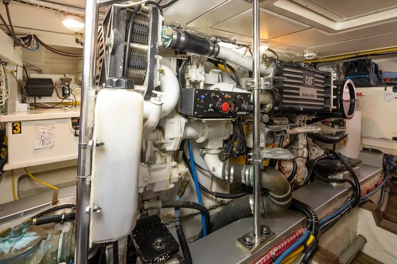 Slide: The Image of Engine room of 2003 Grand Banks 54 Eastbay SX with CAT engine. - 42