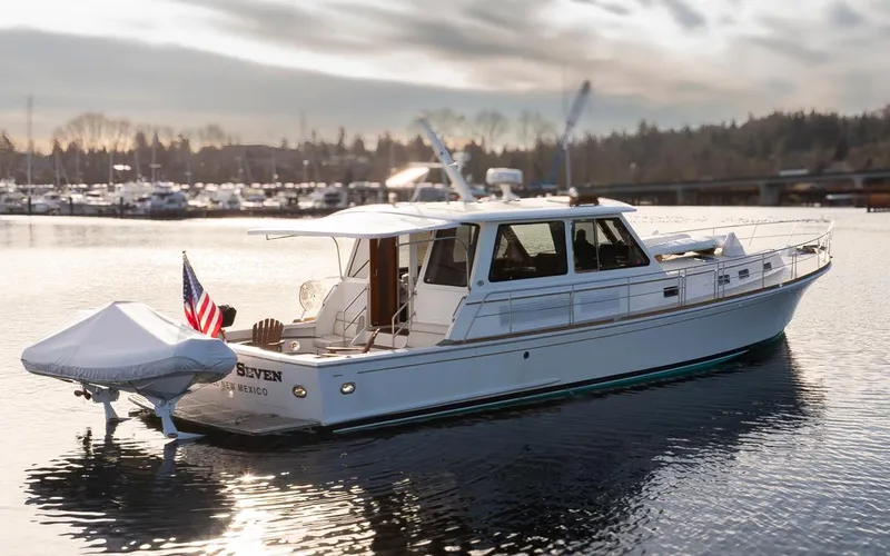 Slide: The Image of 2003 Grand Banks 54 Eastbay SX yacht in harbor. - 9