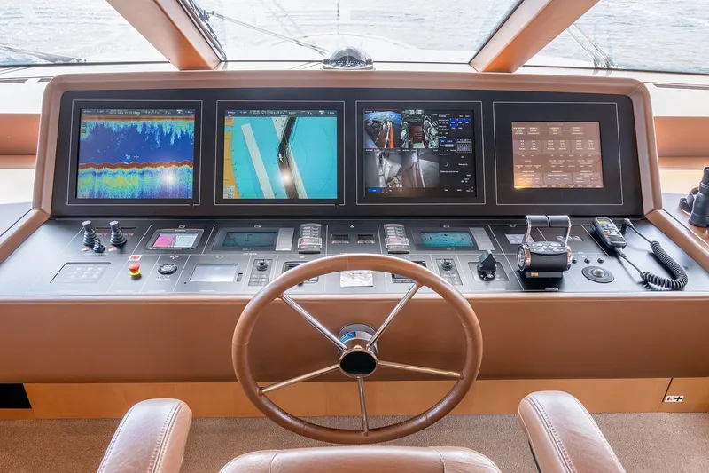 Slide: The Image of 2017 Sanlorenzo SD112 yacht helm with advanced navigation displays and controls. - 29