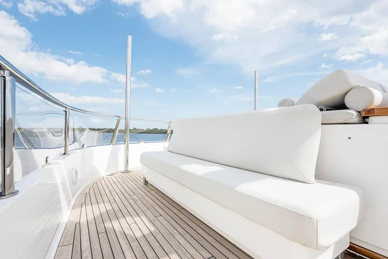 Slide: The Image of Luxurious Sanlorenzo SD112 yacht deck with white seating, 2017 model, under clear blue sky. - 35