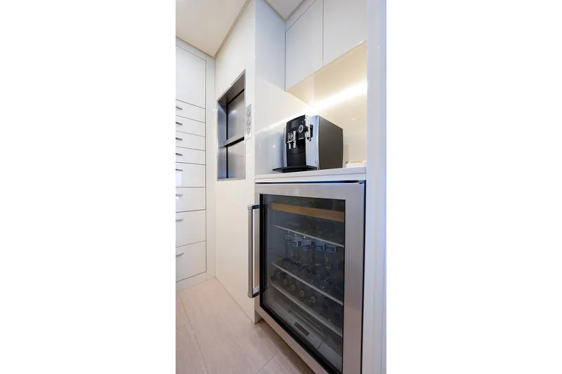 Slide: The Image of Modern kitchen area on 2017 Sanlorenzo SD112 yacht with fridge and coffee machine. - 42