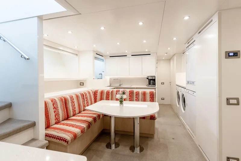 Slide: The Image of Luxurious 2017 Sanlorenzo SD112 yacht interior with modern kitchen and cozy dining area. - 43