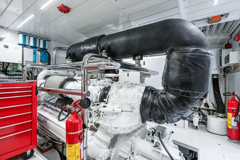 Slide: The Image of Engine room of 2017 Sanlorenzo SD112 yacht with red tool chest and fire extinguishers. - 50