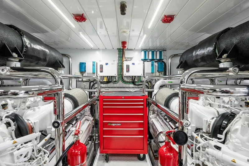 Slide: The Image of Engine room of 2017 Sanlorenzo SD112 yacht with red tool chest and fire extinguishers. - 51