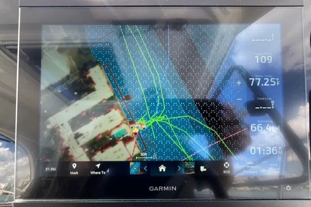 Slide: The Image of Garmin navigation display on 2023 Beneteau Antares 8 boat, showing route and data. - 14