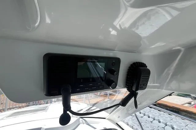 Slide: The Image of Control panel of 2023 Beneteau Antares 8 boat with Garmin radio equipment. - 20