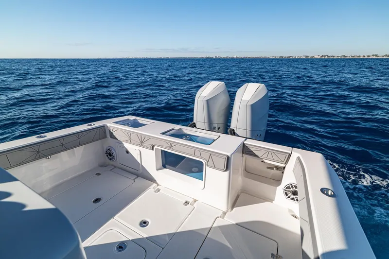 Slide: The Image of 2026 SeaVee 320B boat with dual engines on open ocean. - 30