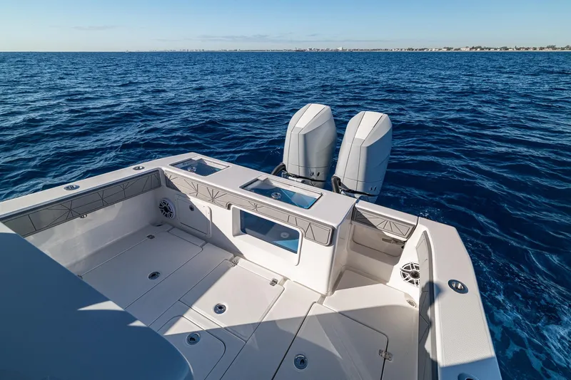 Slide: The Image of 2026 SeaVee 320B boat with dual engines on open ocean. - 31