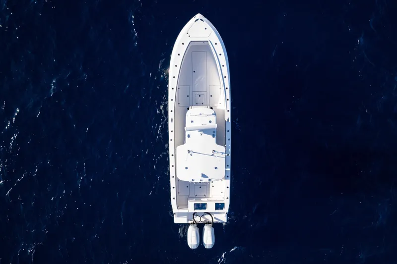 Slide: The Image of Aerial view of 2026 SeaVee 320B boat on deep blue ocean. - 7