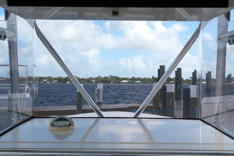 Slide: The Image of View from 2005 Fountain 34 Tournament Edition boat, overlooking a serene waterfront. - 29