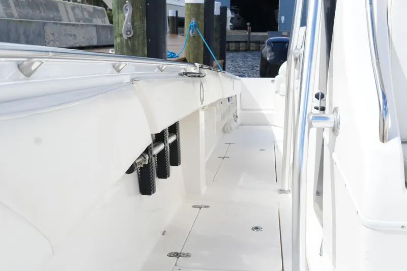 Slide: The Image of 2005 Fountain 34 Tournament Edition boat deck with stainless steel railings. - 33