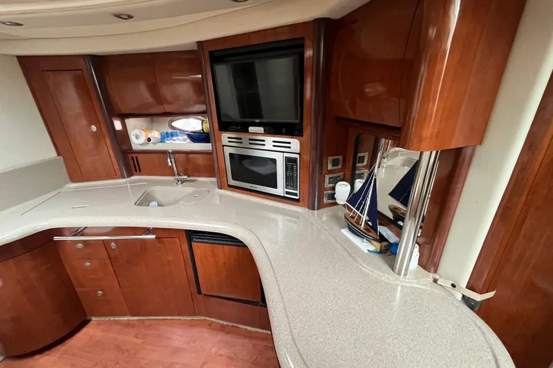 Slide: The Image of Electrical control panel on a 2004 Sea Ray 420 Sundancer boat. - 22