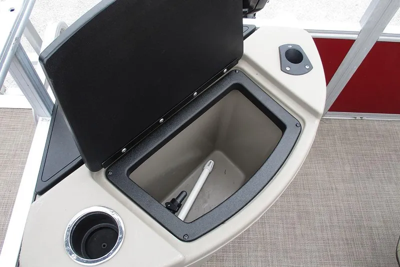 Slide: The Image of Open storage compartment on 2022 Sun Tracker Bass Buggy 18 DLX pontoon boat. - 13