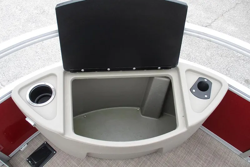 Slide: The Image of 2022 Sun Tracker Bass Buggy 18 DLX storage compartment with cup holders. - 20
