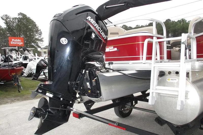 Slide: The Image of 2022 Sun Tracker Bass Buggy 18 DLX pontoon boat with Mercury outboard motor. - 9