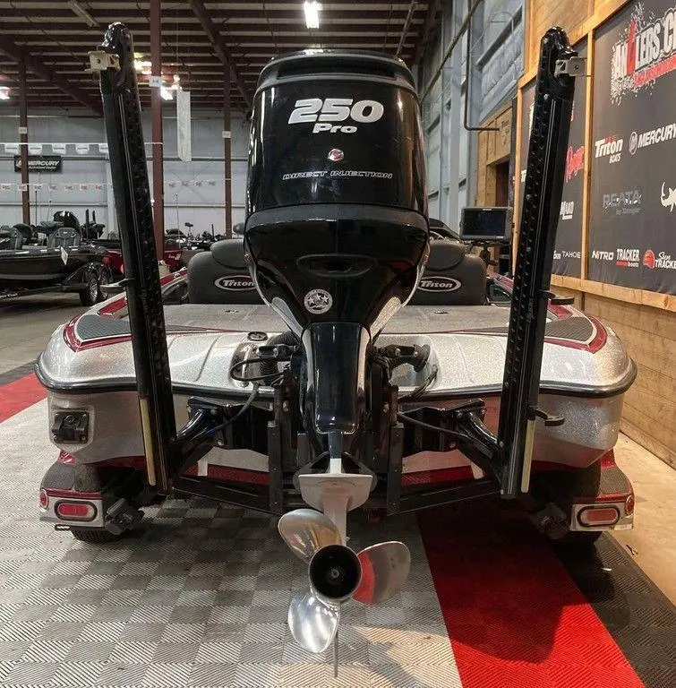 Slide: The Image of 2017 Triton 21 TrX boat with 250 Pro engine in showroom. - 4