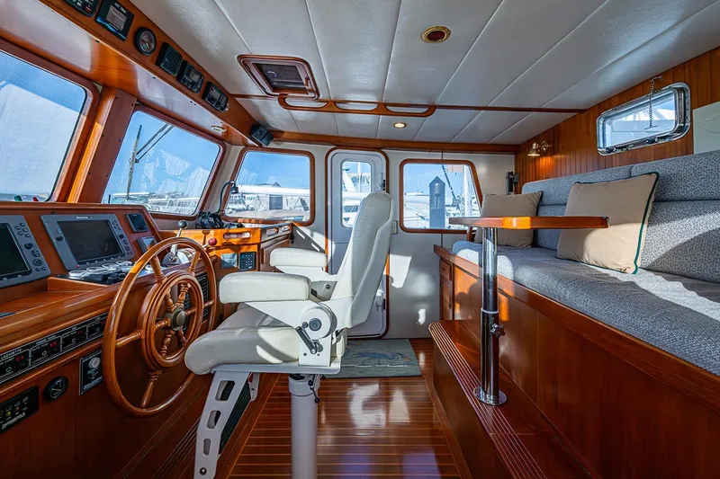 Slide: The Image of Luxurious interior of 2008 Kadey-Krogen 44 yacht with helm and seating area. - 19