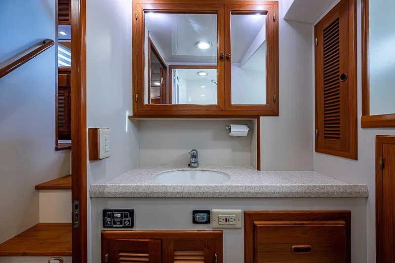 Slide: The Image of Luxurious 2008 Kadey-Krogen 44 yacht bathroom with wooden cabinetry and modern fixtures. - 39