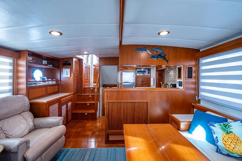 Slide: The Image of Luxurious 2008 Kadey-Krogen 44 yacht interior with wood finishes and comfortable seating. - 5